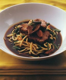 Cassia beef noodles with spinach and garlic chives