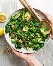 Catalan-style gai lan with raisins and pine nuts