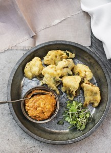 Cauliflower and anchovy fritters with basil almond dip