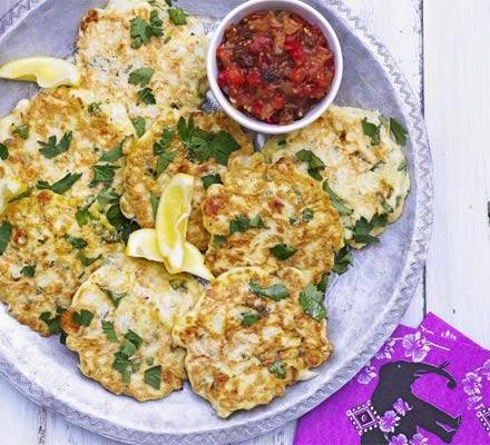 Cauliflower and cheese fritters with warm pepper relish