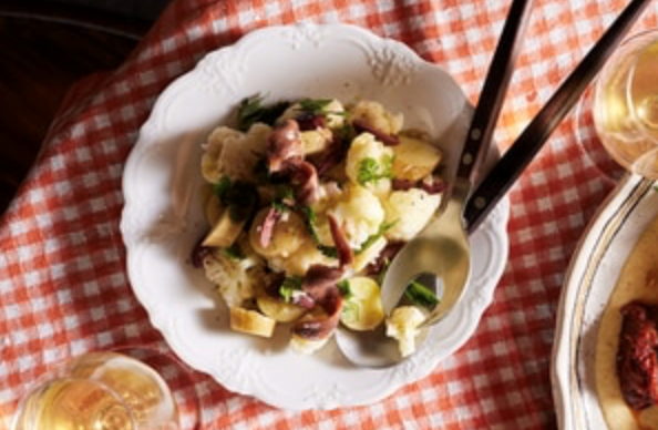 Cauliflower and kipfler potato salad with anchovies and black olives