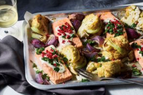 Cauliflower and salmon traybake with tahini sauce