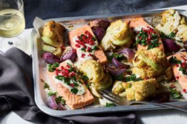 Cauliflower and salmon traybake with tahini sauce