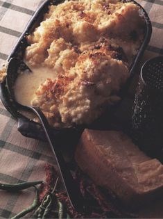 Cauliflower cheese with sun-dried tomatoes, fresh red chilli and crunchy parmesan topping