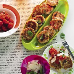 Cauliflower fritters with tomato and spinach