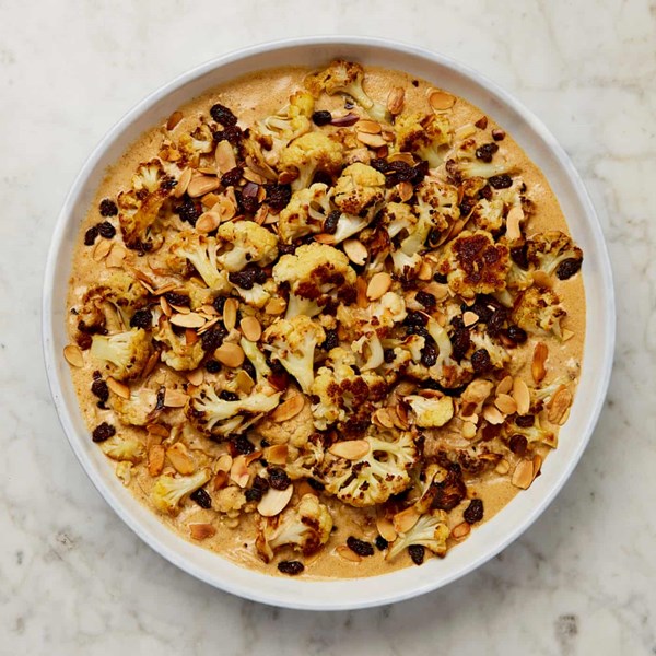 Cauliflower korma with blackened raisins