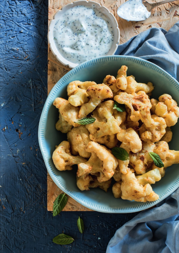 Cauliflower pakora with minted poppy seed yoghurt