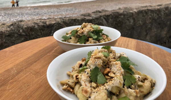 Cauliflower pasta with tahini sauce & hazelnuts