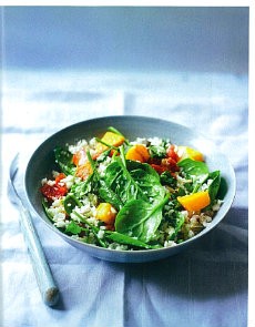 Cauliflower 'rice' salad with squash, seeds and spinach