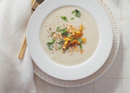 Cauliflower soup with caramelized apples and hazelnuts