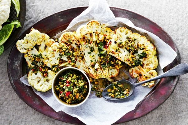 Cauliflower steaks with olive and herb salsa