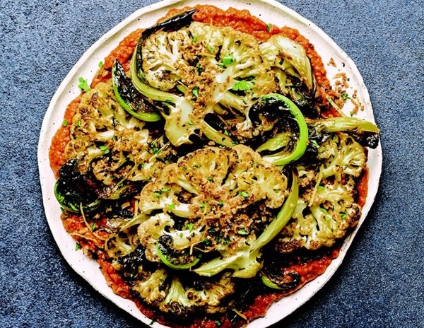 Cauliflower 'steaks' with red pepper sauce