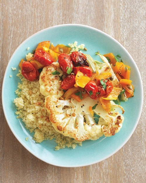 Cauliflower steaks with roasted pepper and tomato salad