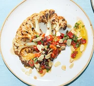 Cauliflower steaks with roasted red pepper & olive salsa