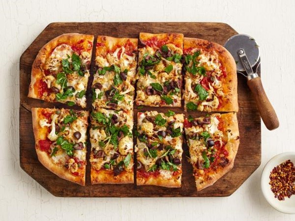 Cauliflower, tomato and olive pizza