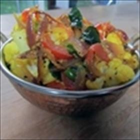 Cauliflower with curry leaves and tomatoes
