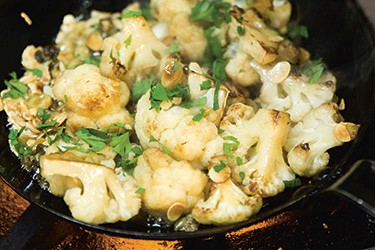 Cauliflower with golden raisins, capers & toasted almonds