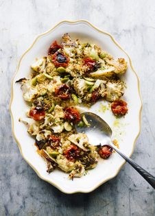 Cauliflower with roasted tomatoes, parsley, and bread crumbs