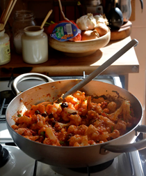 Cauliflower with tomatoes, anchovies, olives and capers