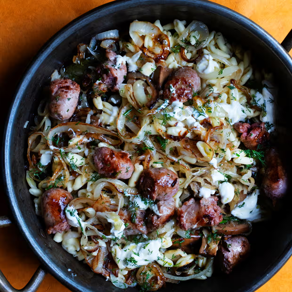 Cavatelli with sauerkraut, sour cream and sausage