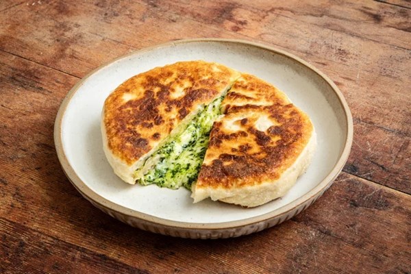 Cavolo nero pesto and Taleggio-stuffed sourdough flatbreads
