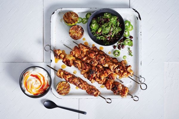 Cayenne chicken skewers with black bean salsa