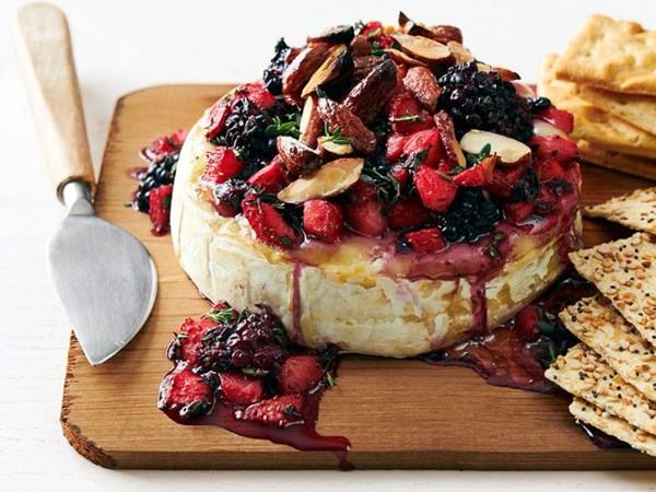 Cedar plank-grilled Brie with berries