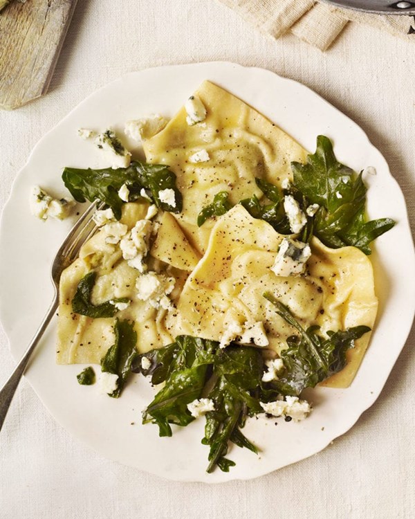 Celeriac and sage ravioli with buttered kale and blue sheep's cheese