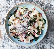 Celeriac ribbon 'pasta' with chard, garlic & pumpkin seeds