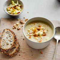 Celeriac soup with cheddar, apple and walnuts