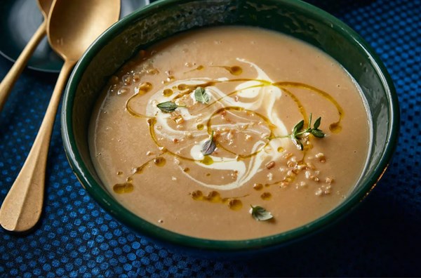 Celeriac soup with toasted hazelnuts & truffle oil