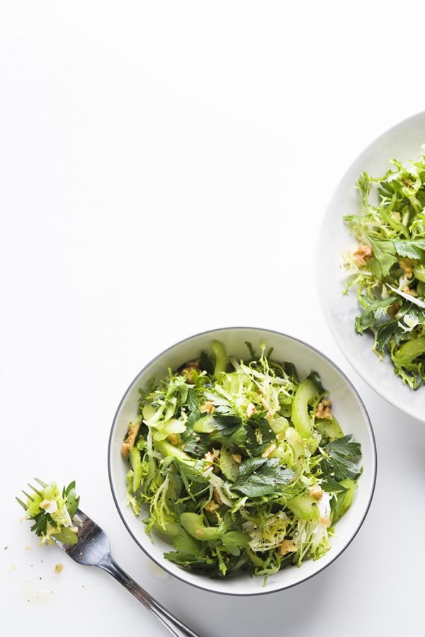 Celery and frisée salad with parsley and walnuts