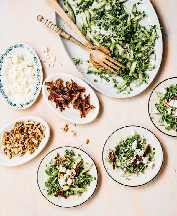 Celery, date, and feta salad with arugula microgreens