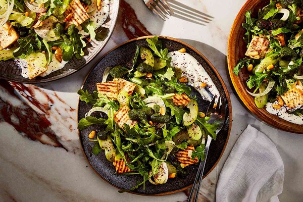 Celery salad with arugula, feta, and pita