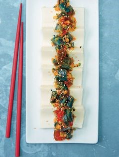 Century-old egg on silken tofu with Sichuanese green mustard pickles, sesame & shichimi pepper 