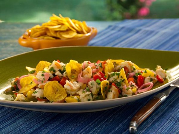 Ceviche with serrano chiles, mango, and smoked tomatoes
