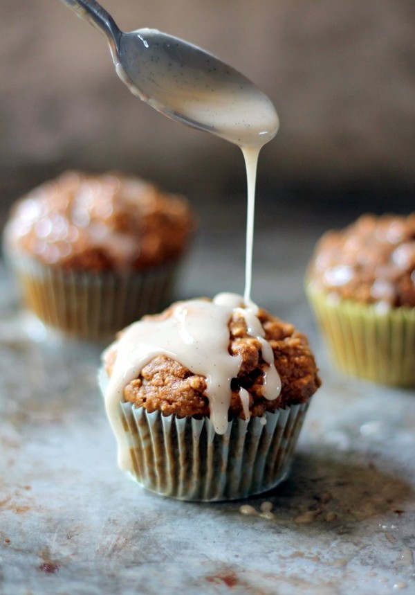 Chai-spiced pumpkin oatmeal muffins with vanilla bean cream cheese glaze