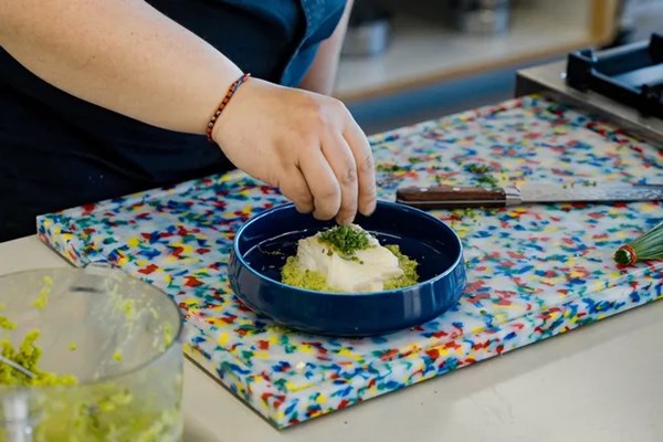Chamomile-butter poached cod with sweet pea purée