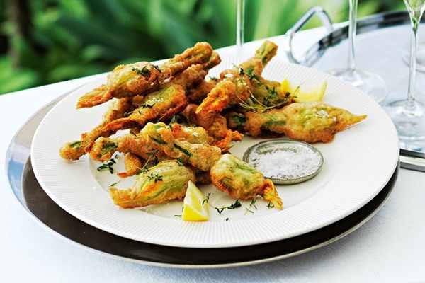 Champagne-battered zucchini flowers with cheese