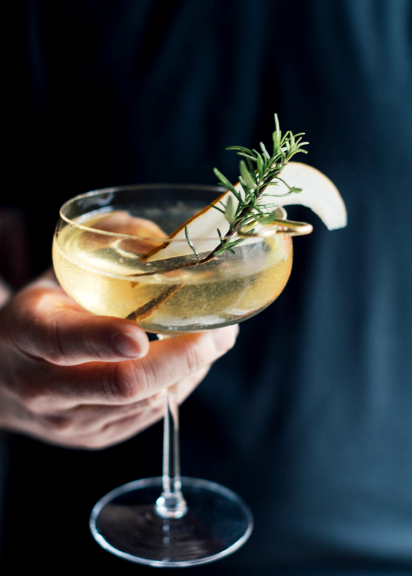 Champagne cocktail with elderflower & pear syrup