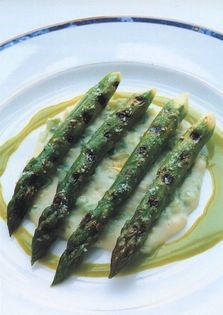 Char-grilled asparagus on a bed of champ with chervil sauce