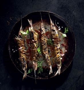 Char-grilled garfish in vine leaves (Asmada zargana)