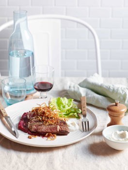 Char-grilled Scotch fillet with beetroot purée, horseradish cream and crisp-fried onions