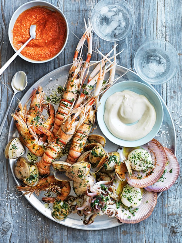 Char-grilled seafood platter with romesco and aioli