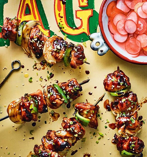 Char siu chicken sticks with pickled radish and carrot salad