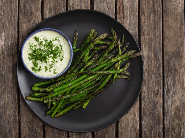 Charcoal chimney–grilled asparagus with green goddess dressing 