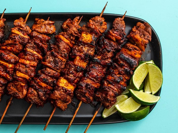 Charcoal-grilled al pastor skewers 