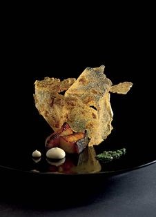 Charcoal-grilled miso black cod with Jerusalem artichoke skin, wasabi cream and tonburi
