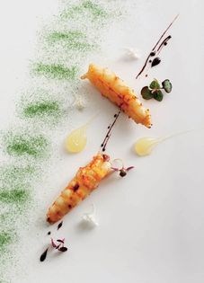 Charcoal-grilled New Zealand scampi with sudachi, shiso and blood orange caramel, and mitsuba