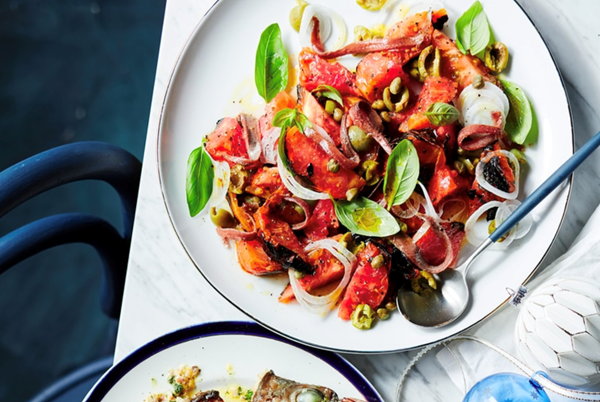 Charcoal grilled ox-heart tomato, olive, onion and anchovy salad
